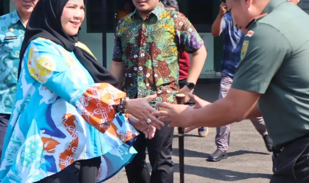 Walikota Bandar Lampung Hj. Eva Dwiana Melakukan Peletakan Batu Pertama dalam Rangka Pembangunan Aula Kodim 0410/KBL di Kecamatan Langkapura